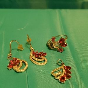 Womens size 9 ruby ring, earrings and pendant set